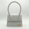 Jacquemus Le Chiquito Moyen leather top-handle bag in white