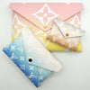 Load image into Gallery viewer, Louis Vuitton Kirigami Pochette in Gradient Pastel Multicolor