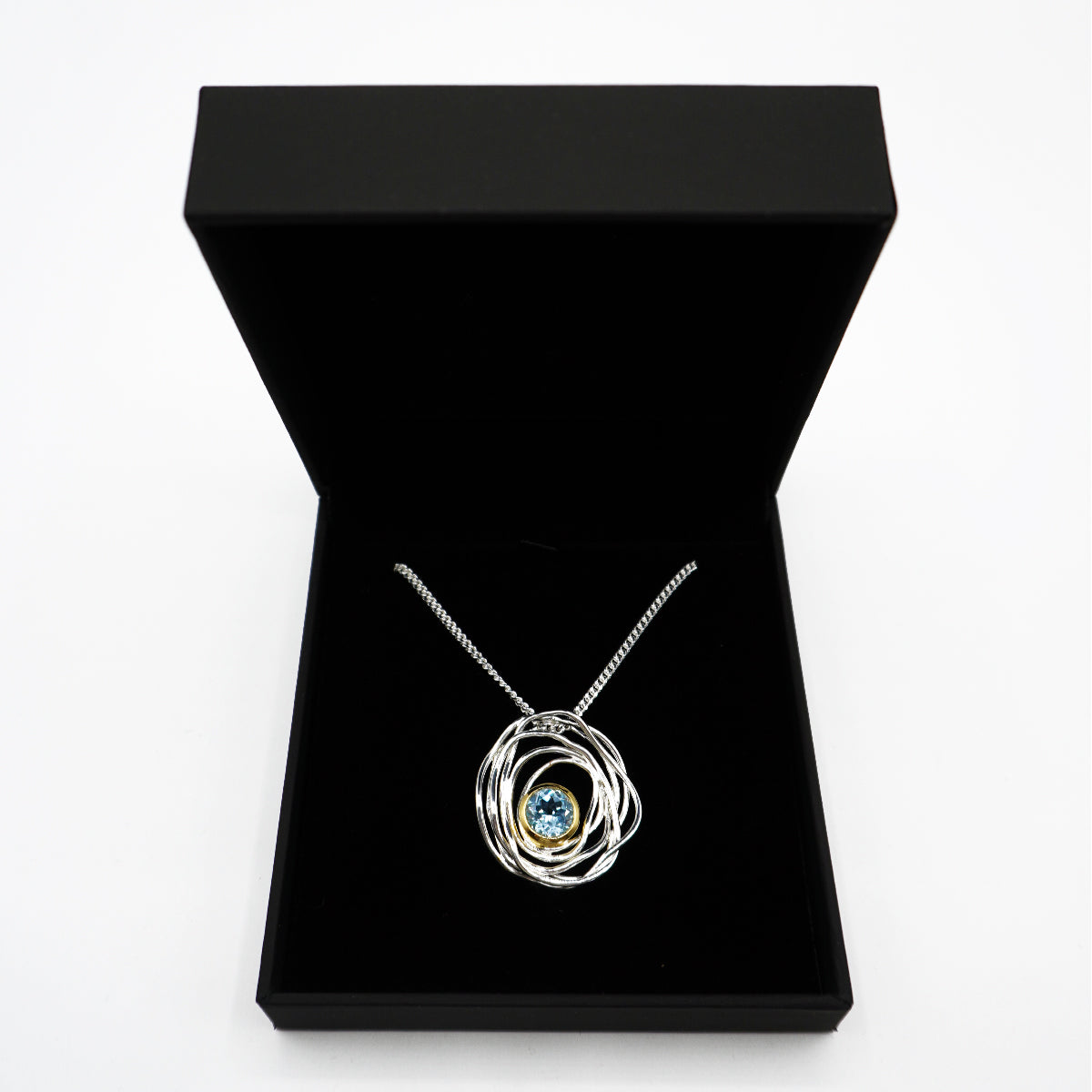 Silver and Topaz Pendant